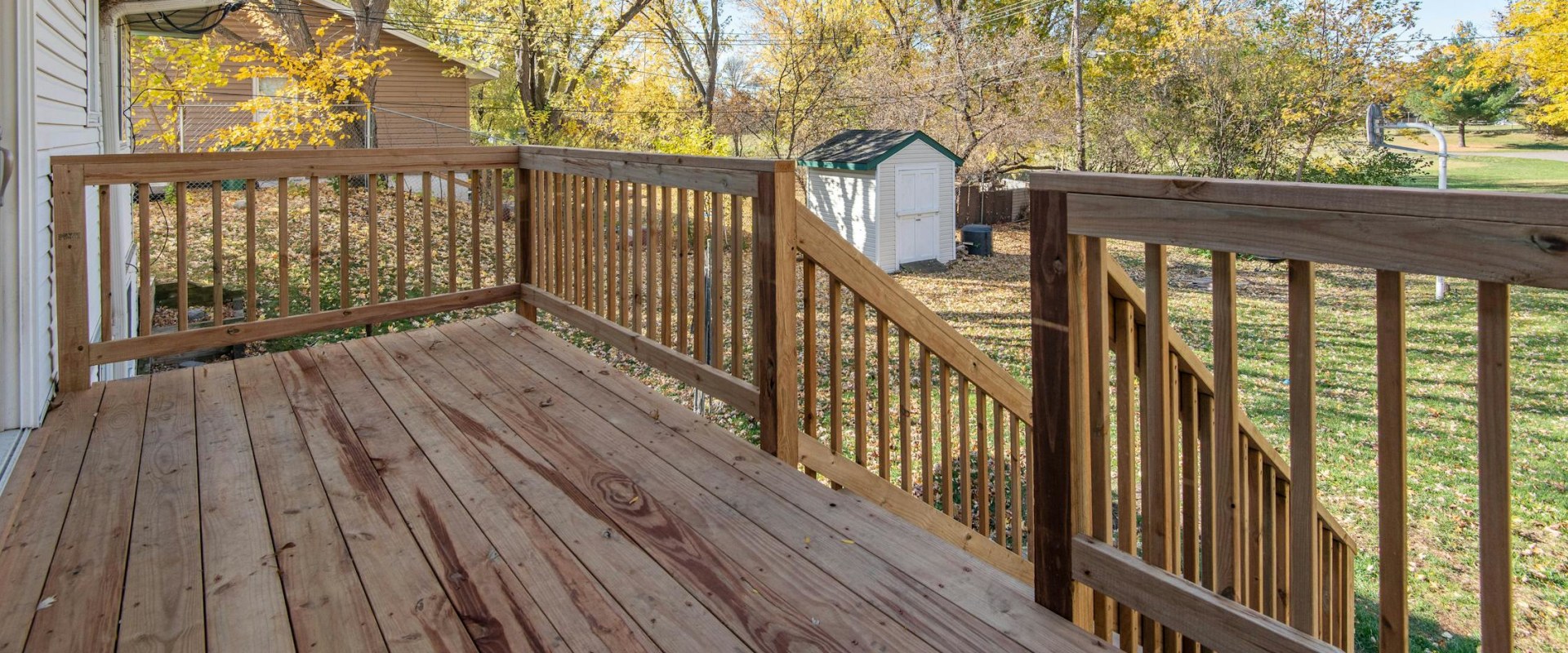 Ensuring A Seamless Transition: Working With A Kalamazoo Roofer Post-Deck Construction